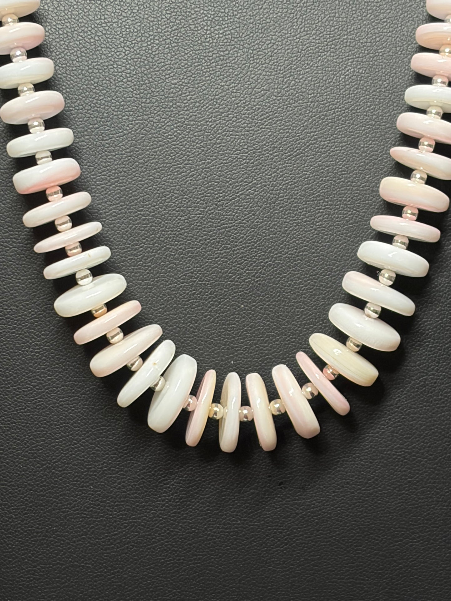 The Queen of the Conch Necklace