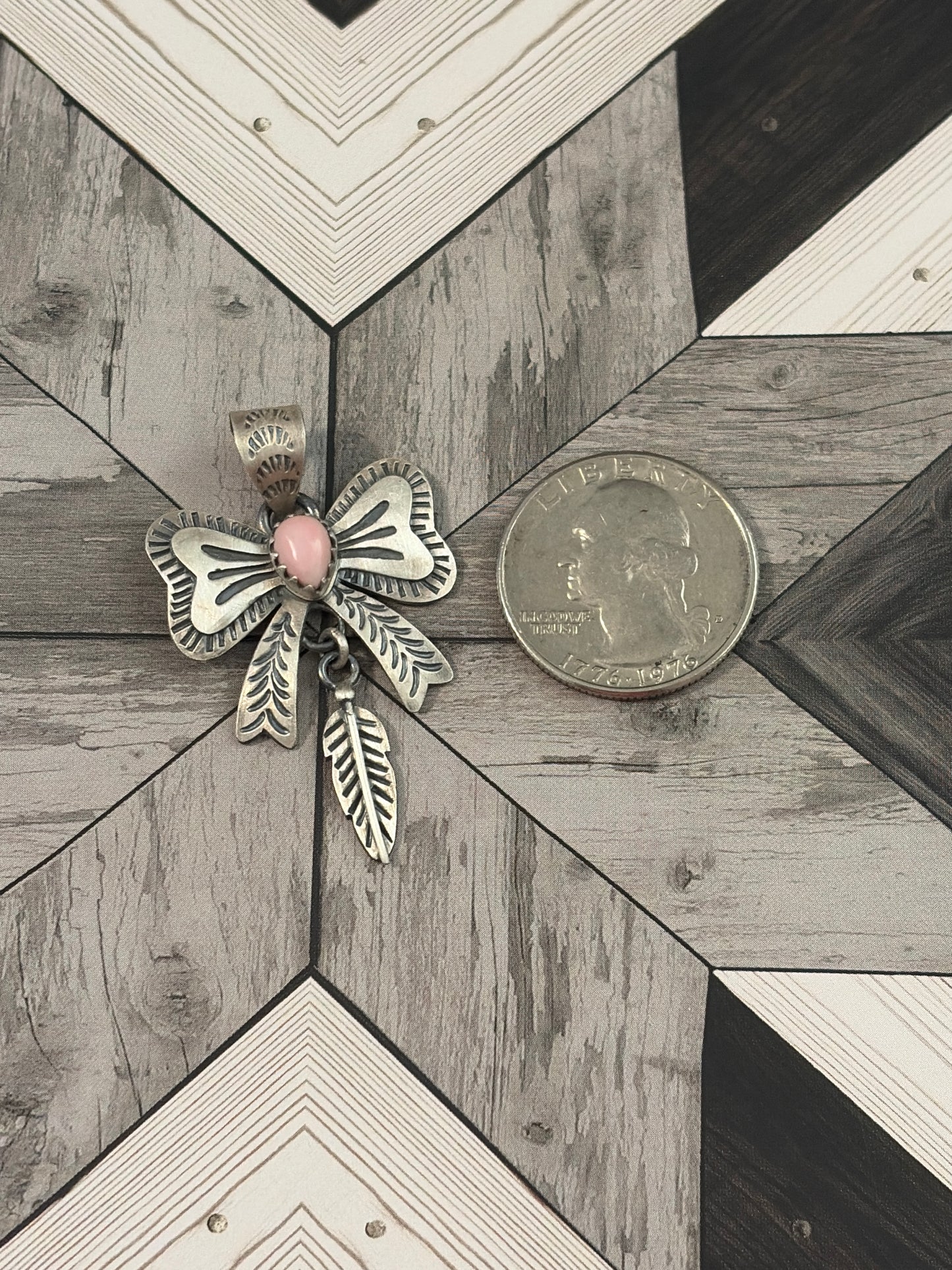 Handcrafted Pink Conch Bow & Feather Pendant