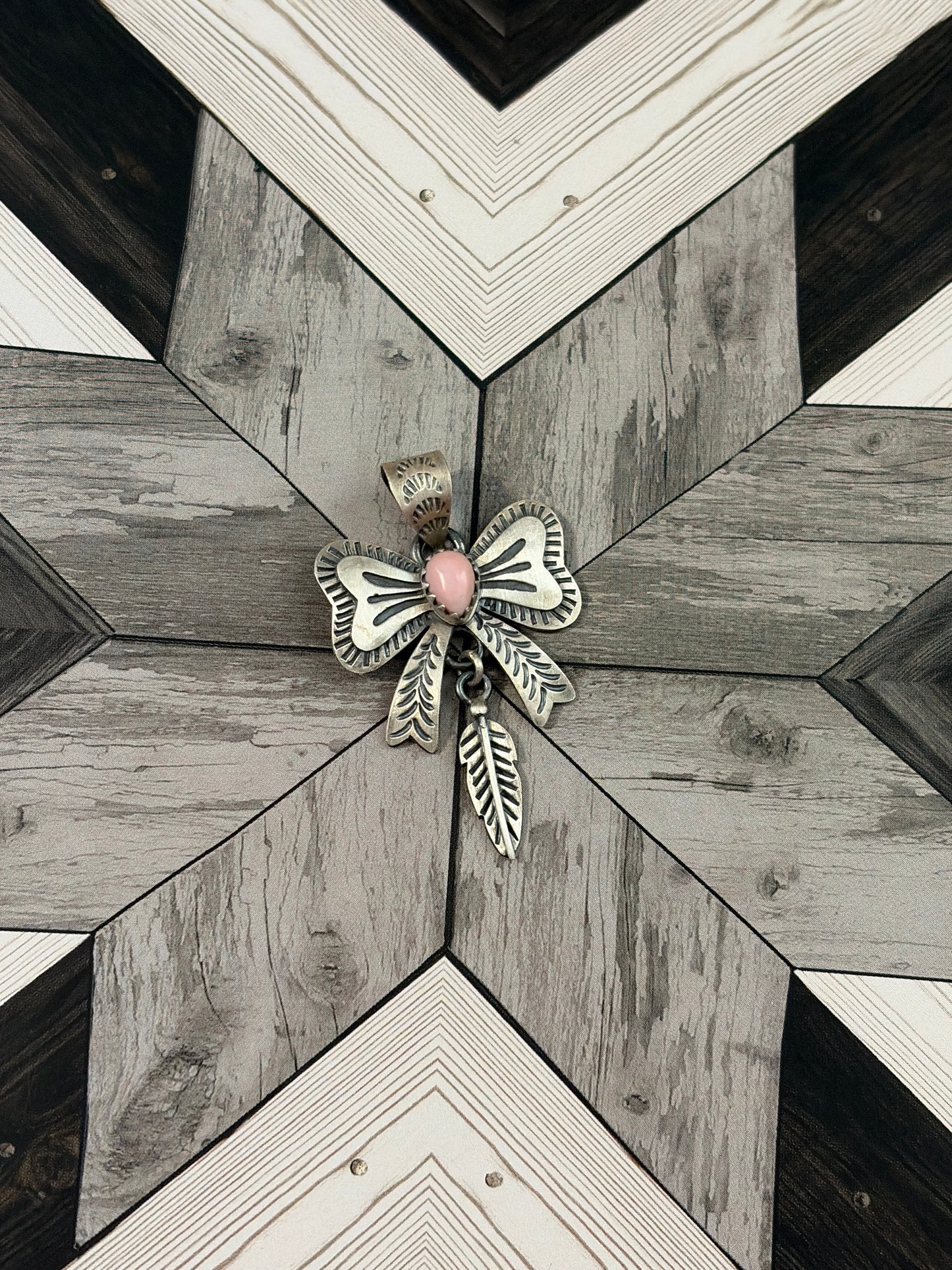 Handcrafted Pink Conch Bow & Feather Pendant