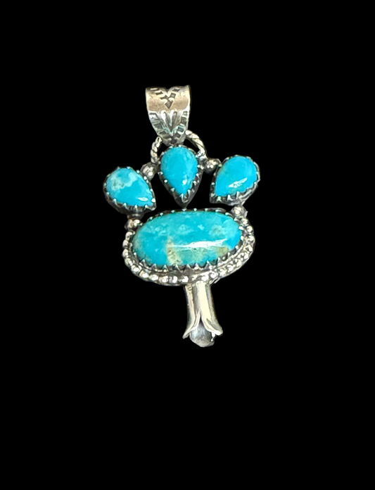 Handcrafted Kingman Turquoise Paw with Blossom Pendant